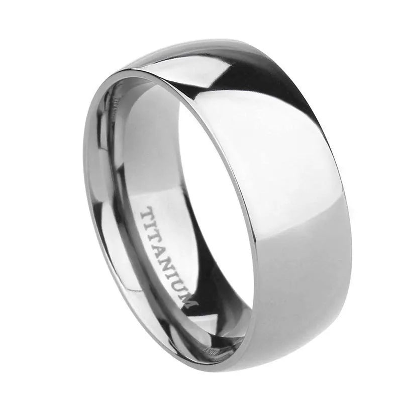 Silver titanium steel band ring shown in different widths on a hand.