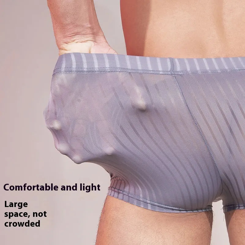 Men's thin striped underwear in black, laid flat showing Free Size fit and nylon fabric texture.