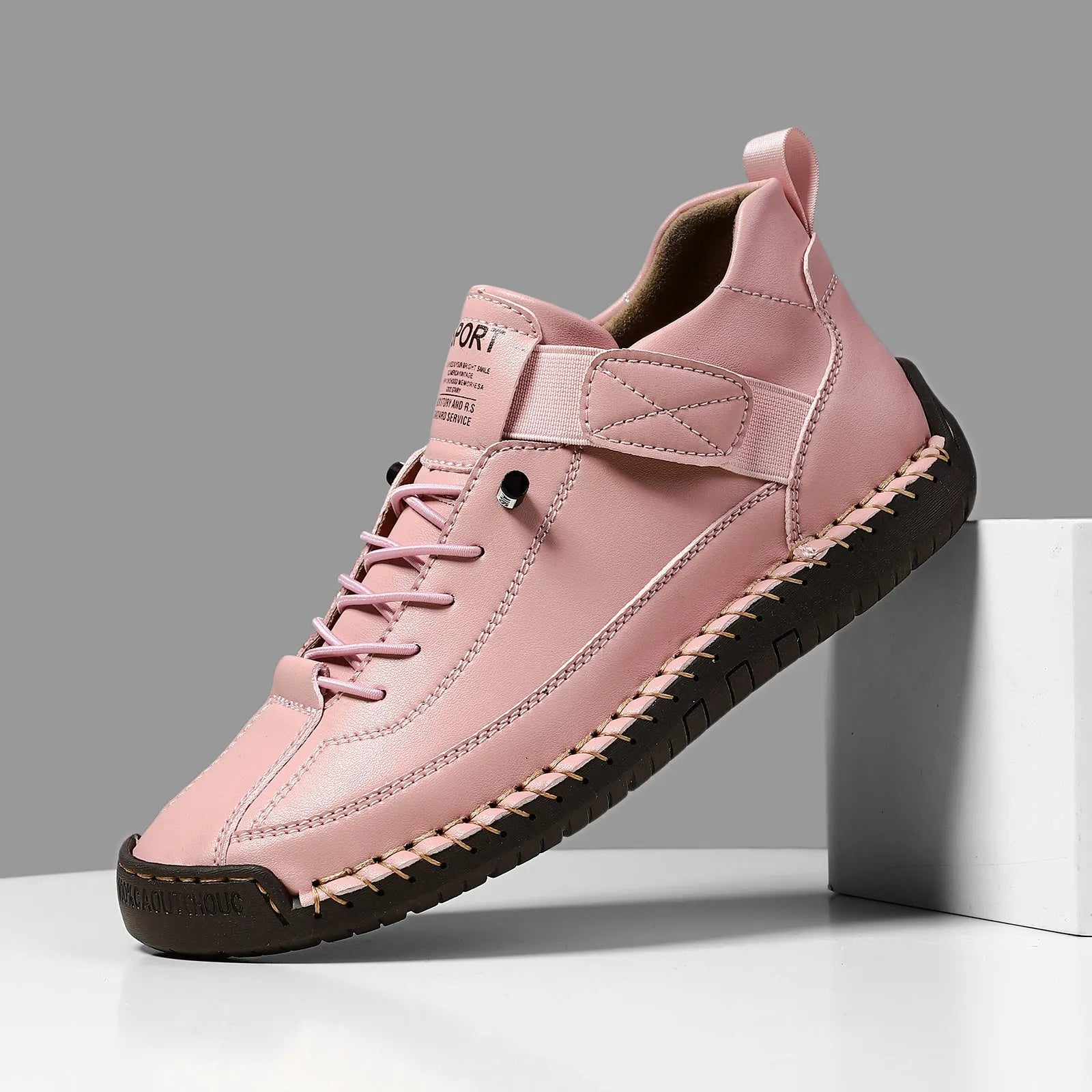 Men's mid-top Martin boots with microfiber upper, leather lining, and rubber sole in solid colour options for winter outdoor wear.