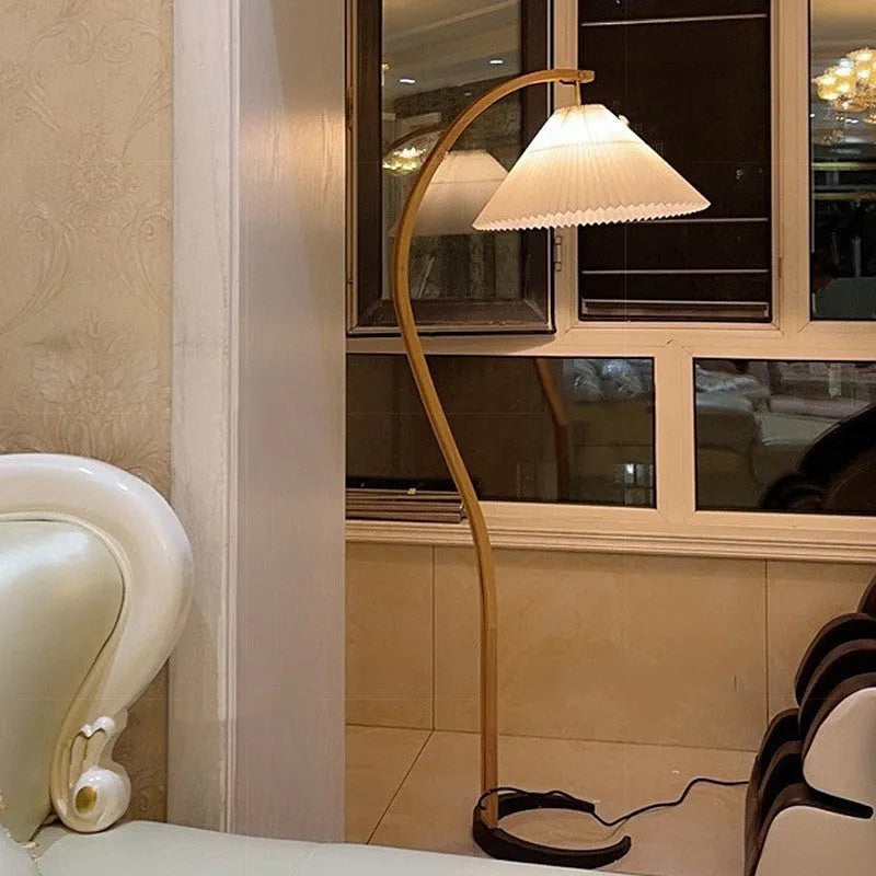 Vertical retro-style table lamp with fabric lampshade on metal base