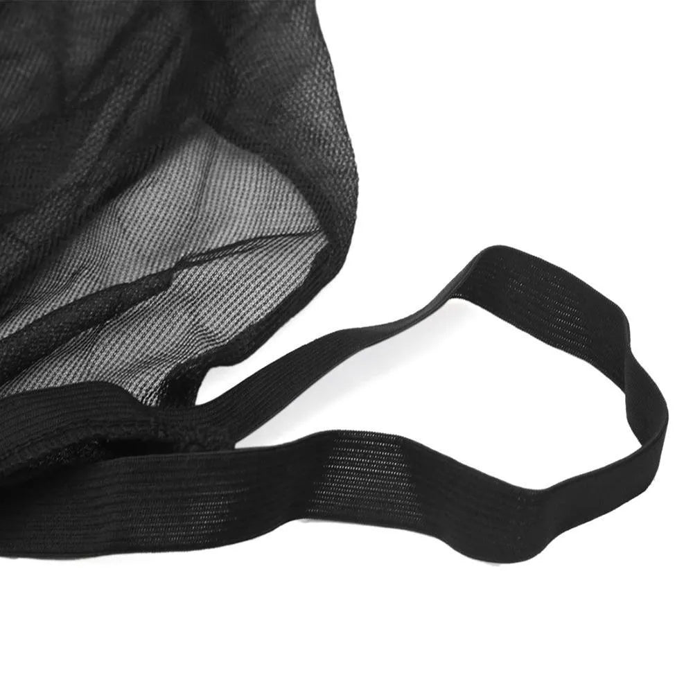 Set of four grey mesh car side window sunshades with elastic edges, shown fitted on a car.