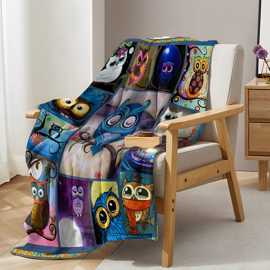 Flannel owl pattern soft fluffy multicoloured blanket in three sizes on a sofa setting