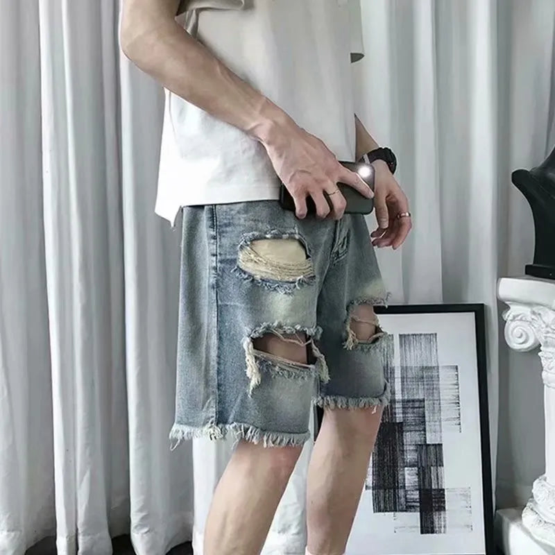 Men's thin ripped denim shorts in retro colour with handmade distressing, Bermuda length, size L