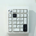Wireless mechanical numeric keyboard with dedicated number pad shown in black and white colour options