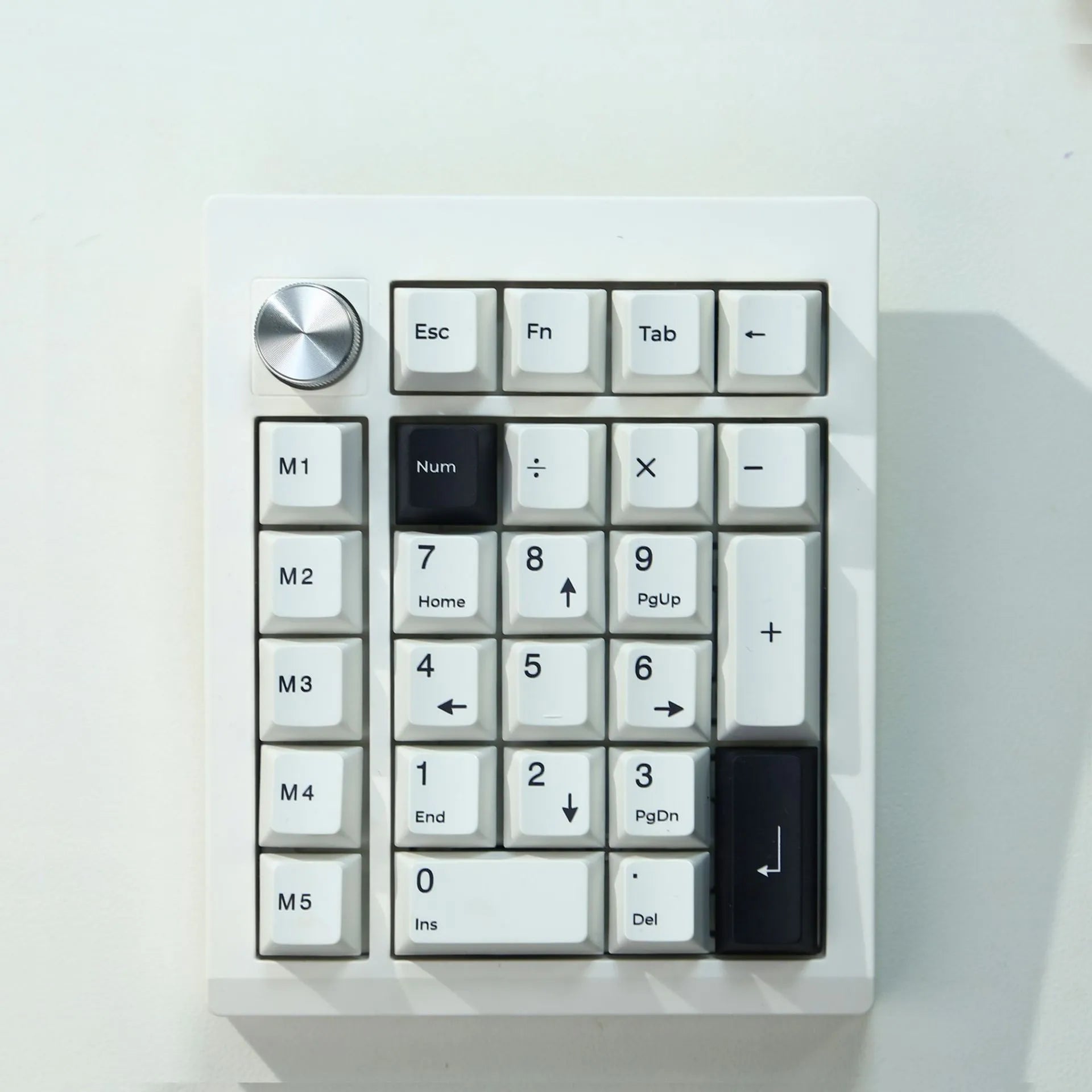 Wireless mechanical numeric keyboard with dedicated number pad shown in black and white colour options