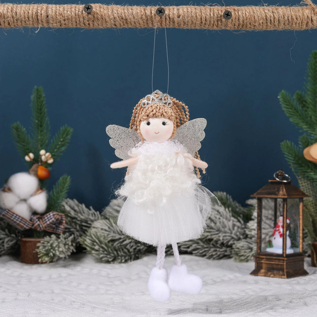 Cartoon-style cloth Christmas angel pendant hair ornament for girls on a high ponytail.