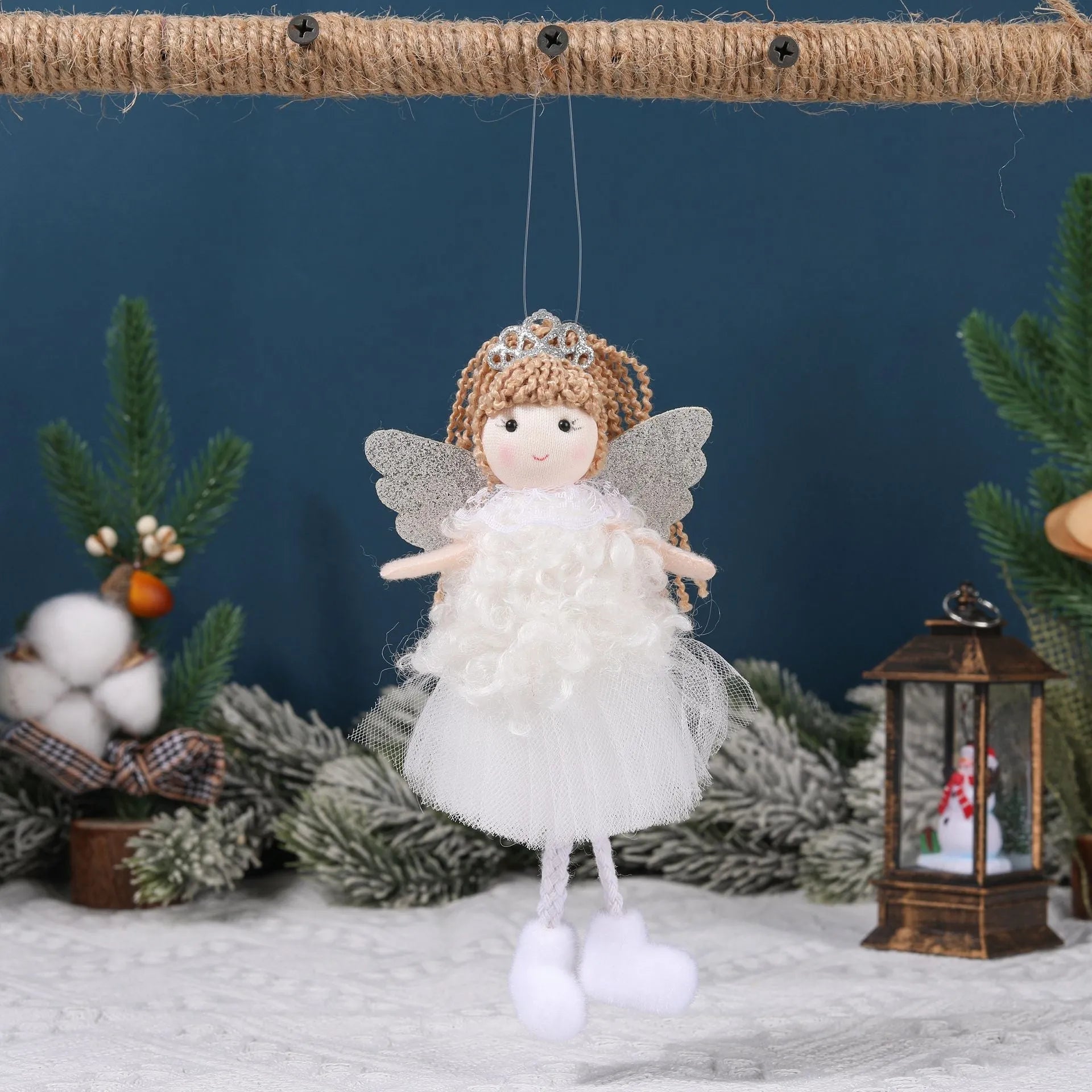 Cartoon-style cloth Christmas angel pendant hair ornament for girls on a high ponytail.