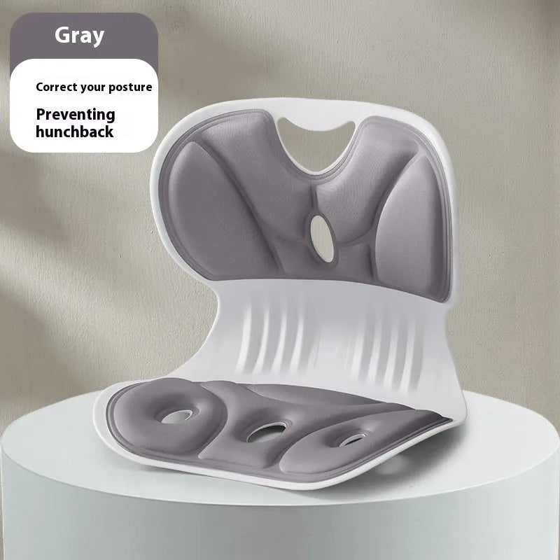 Solid colour memory foam lumbar support cushion shown in grey on an office chair.