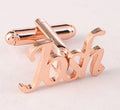 Handmade frosted personalised name abbreviation metal cufflinks in gold colour on a grey background