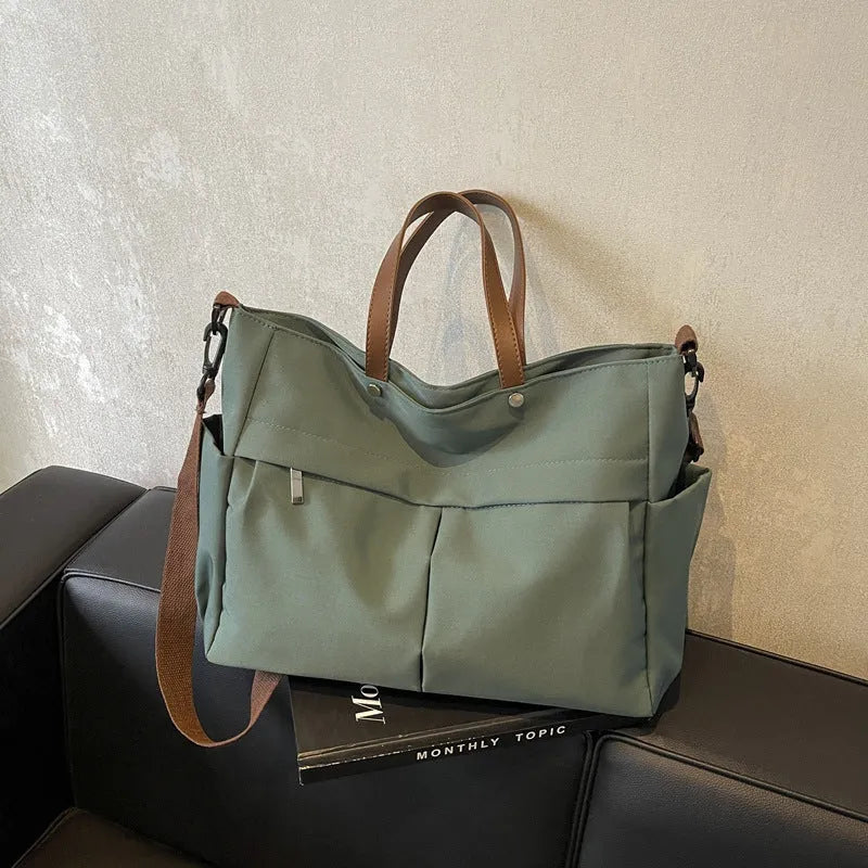 Nylon crossbody tote bag in black colour with shoulder strap