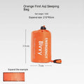 Emergency tent kit with sleeping bag and raincoat components for outdoor survival
