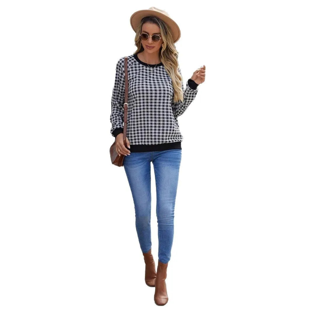 Black long sleeve pullover sweater with a Japanese sweet plaid and striped pattern.
