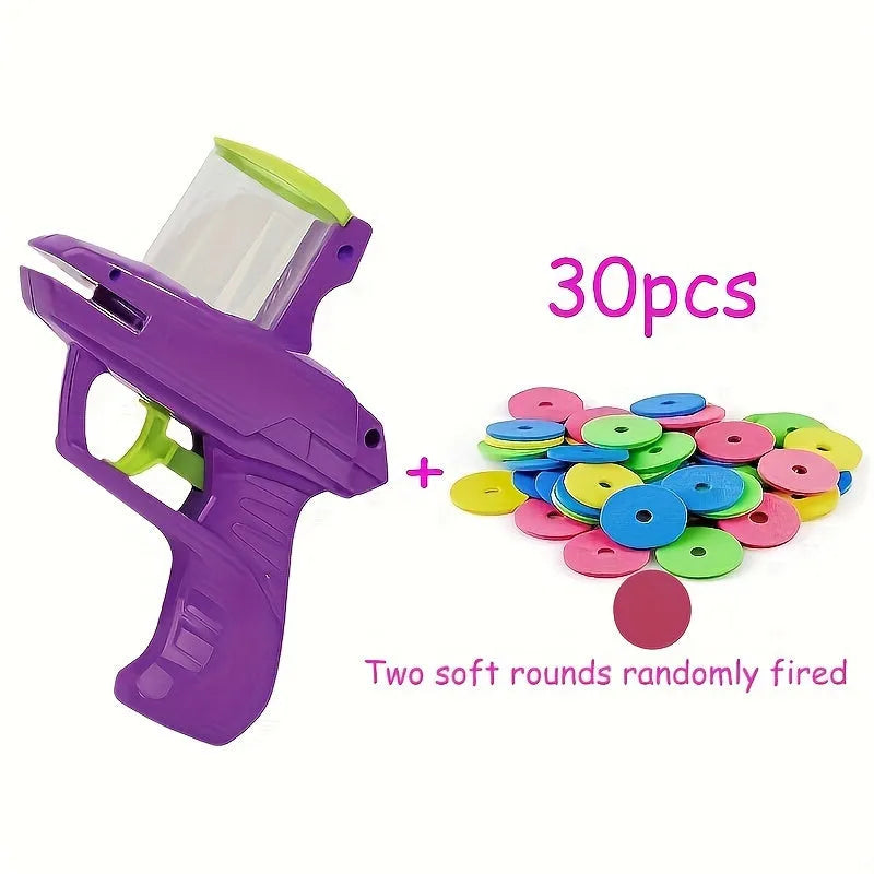 Green interactive cat toy launcher with foam discs for automatic launching play