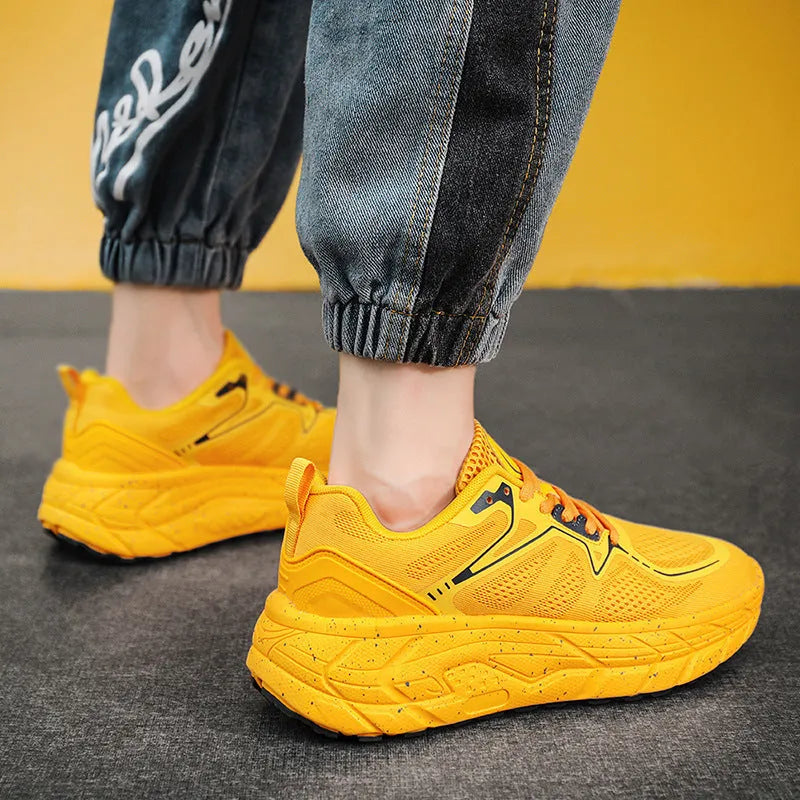 Cushioned rebound long-distance running shoes with breathable mesh upper, rubber and EVA sole, front lacing, in white, black, red, or yellow.