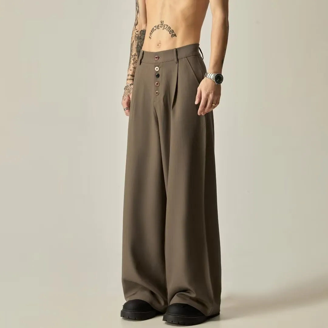 Men's solid colour casual trousers with wide-leg design and elasticated waist in cotton-polyester blend fabric