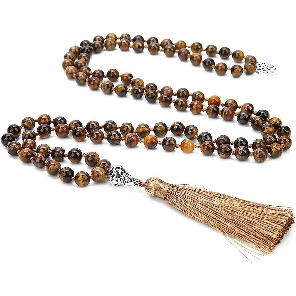 Long handmade necklace with 108 small round stone beads on a black cord, shown doubled up.