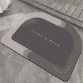 Super absorbent oval bath mat in grey with non-slip rubber bottom, 40x60cm