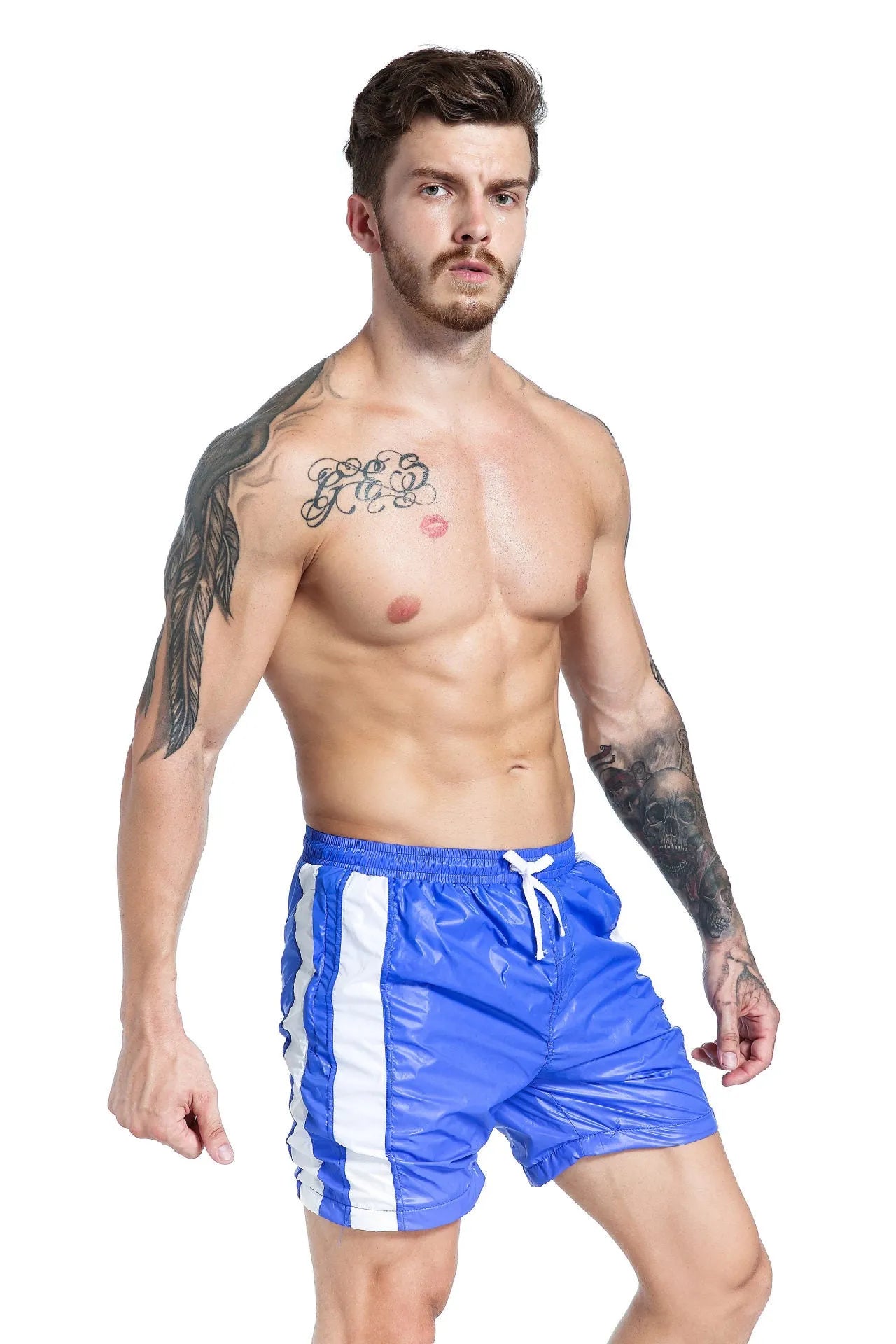 Men's blue lace-up sports shorts with slim fit and removable padding on athletic background