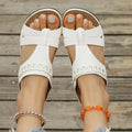 Women's Roman style slippers with fish mouth toe and slope heel in multiple colours on a rubber sole.