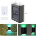 Solar garden wall light with plastic housing measuring 30x75x100mm providing decorative outdoor illumination