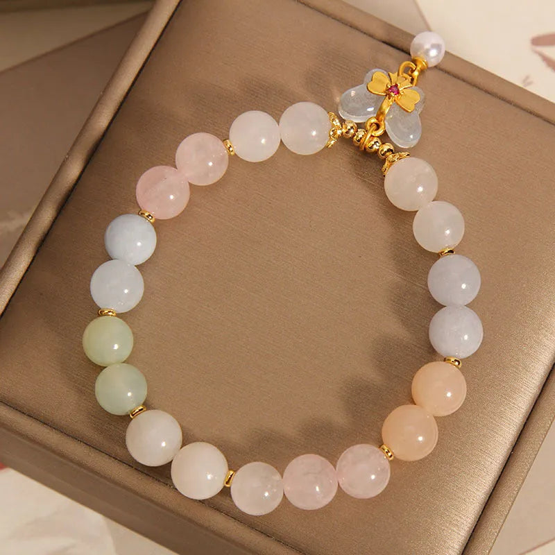 Women's bracelet with colourful Morganite butterfly pendant and crystal links.
