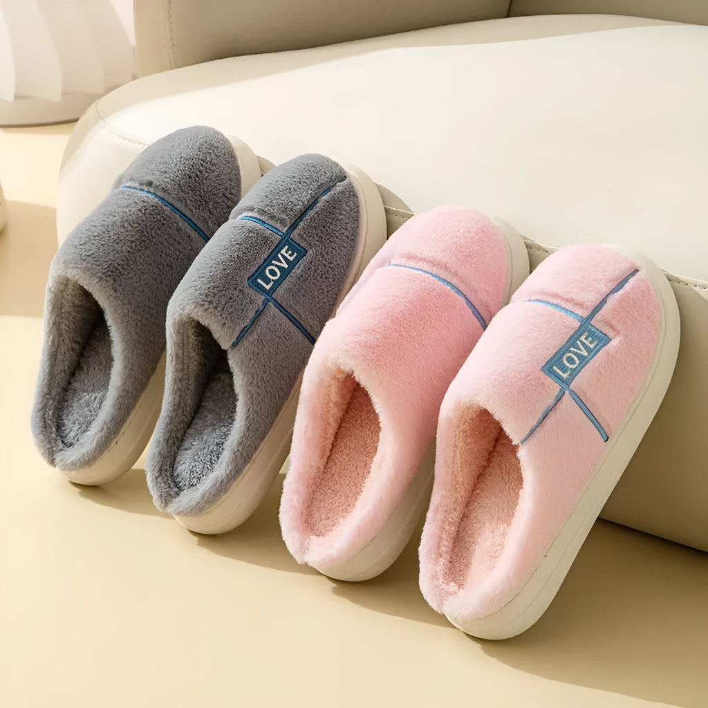 Women's indoor furry slippers in solid colour with plush upper and rubber sole for winter warmth
