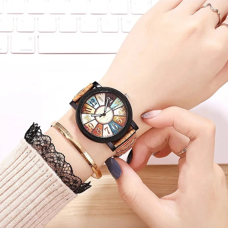 Women's vintage style leather strap quartz watch with 37mm round dial and stainless steel buckle