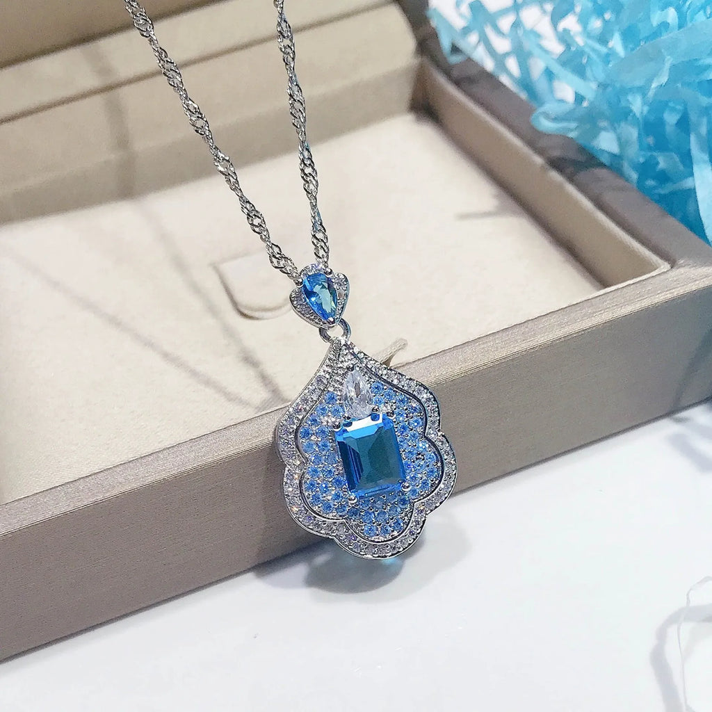 Sea blue geometric copper pendant with aquamarine topaz mirror finish