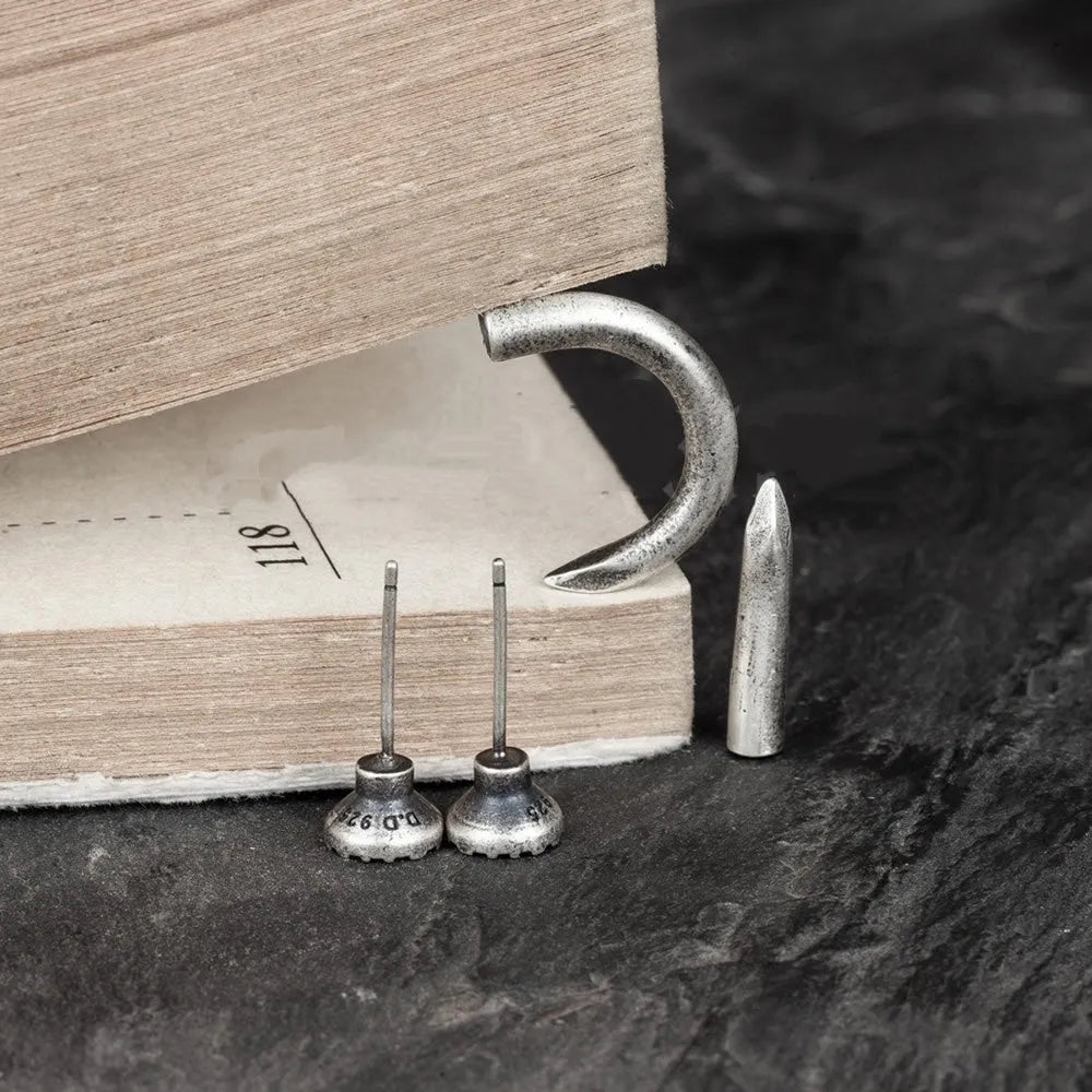S925 sterling silver punk nail stud earring in straight or curved single design.