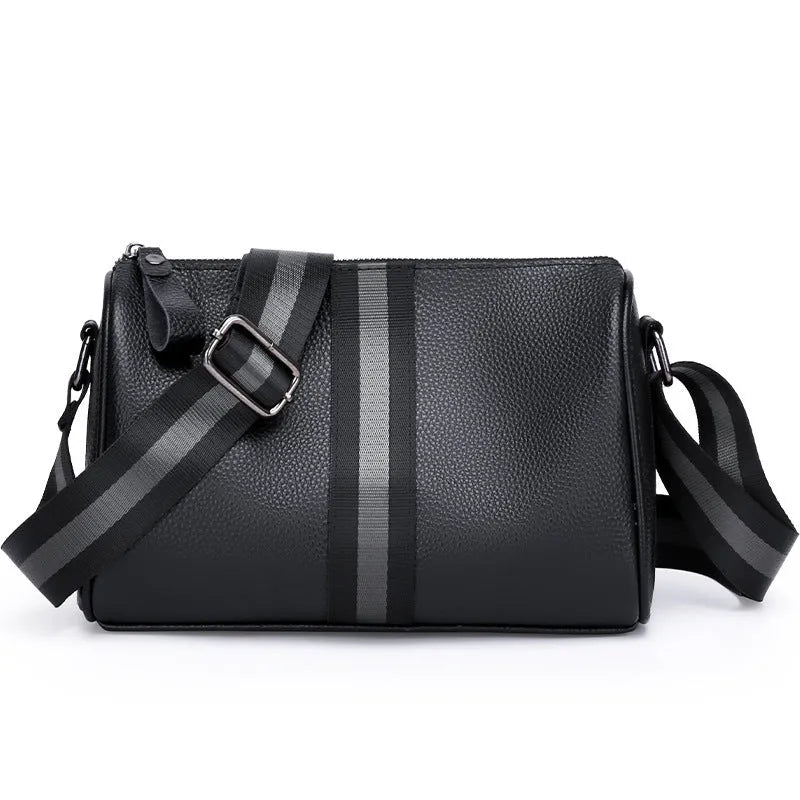 Black genuine leather one-shoulder crossbody bag showing its large capacity and strap.