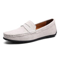 Men's brown suede Gommino casual loafers with a round toe and flat rubber sole.