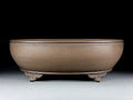Handmade oval purple sand flowerpot for plants on desk or ground, 50 cm long.