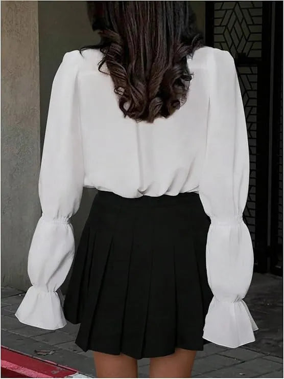Women's polyester shirt with lantern sleeves, ruffle detail, round neck, single-breasted front, in white, pink, or black.