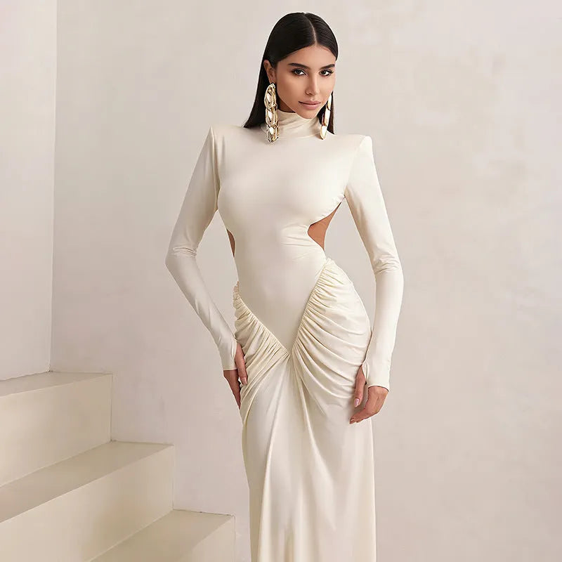 Long sleeve high collar slim fit backless pleated dress in solid colour on a model