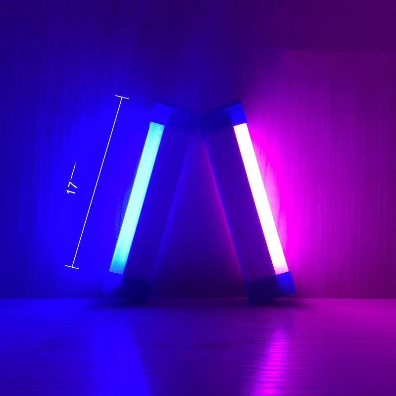 Rechargeable dimmable LED tube light in blue or purple colour showing 17cm, 32cm, and 52cm size options.
