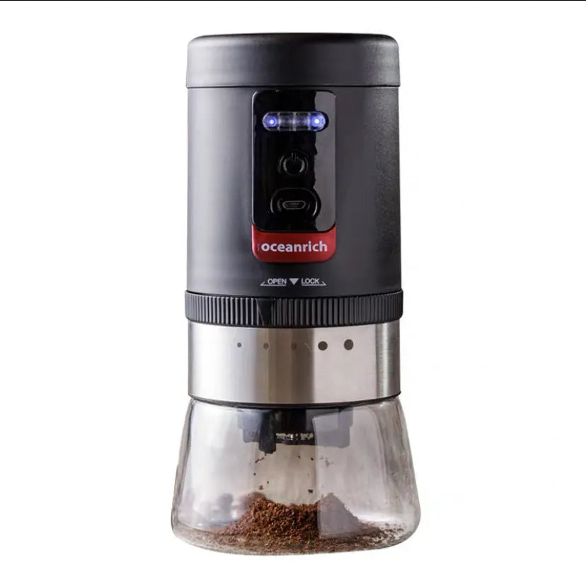 Portable black hand crank coffee grinder with manual operation for travel and home use