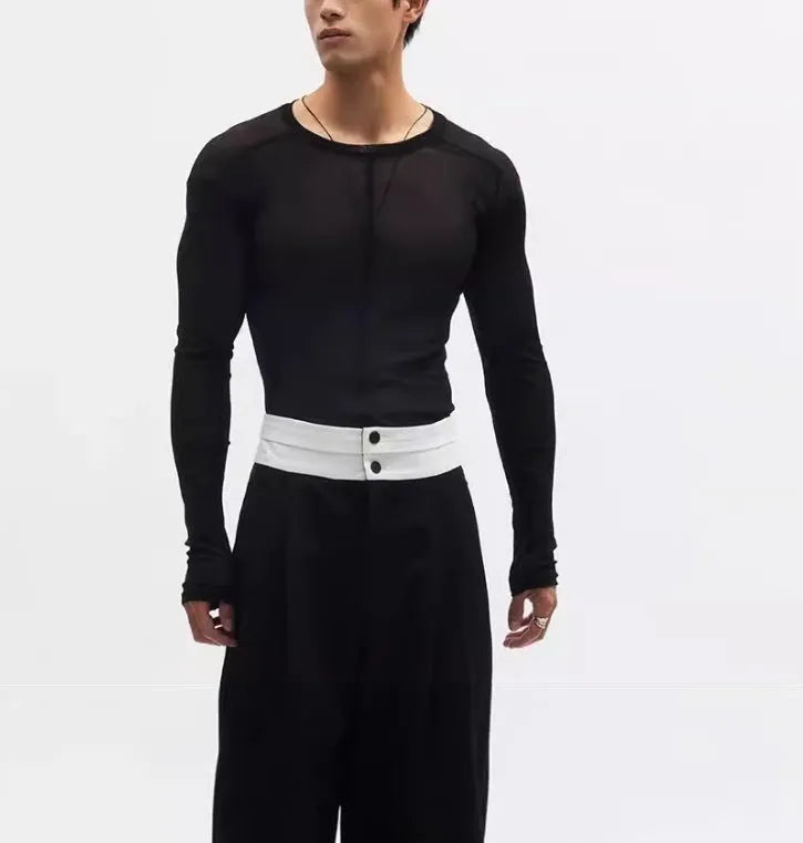 Black slim-fit women's long sleeve mesh top with see-through PU texture and round neck.