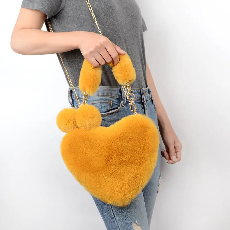 Medium sized heart shaped soft plush handbag for women with zip opening