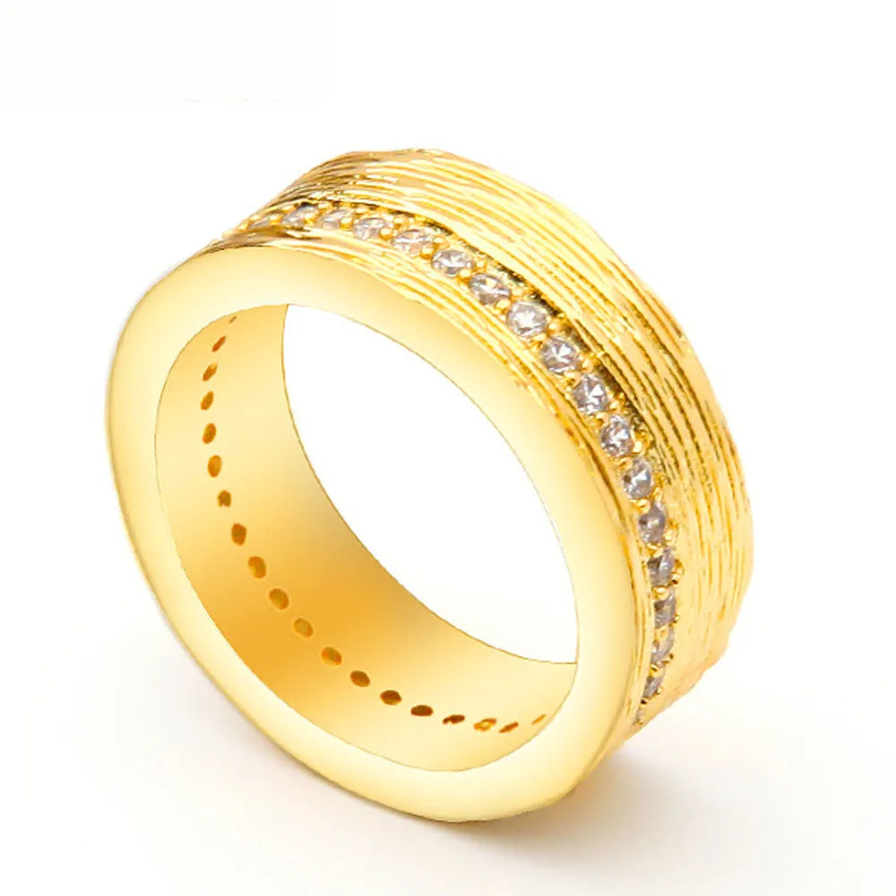 Gold geometric zircon women's ring on a white background.