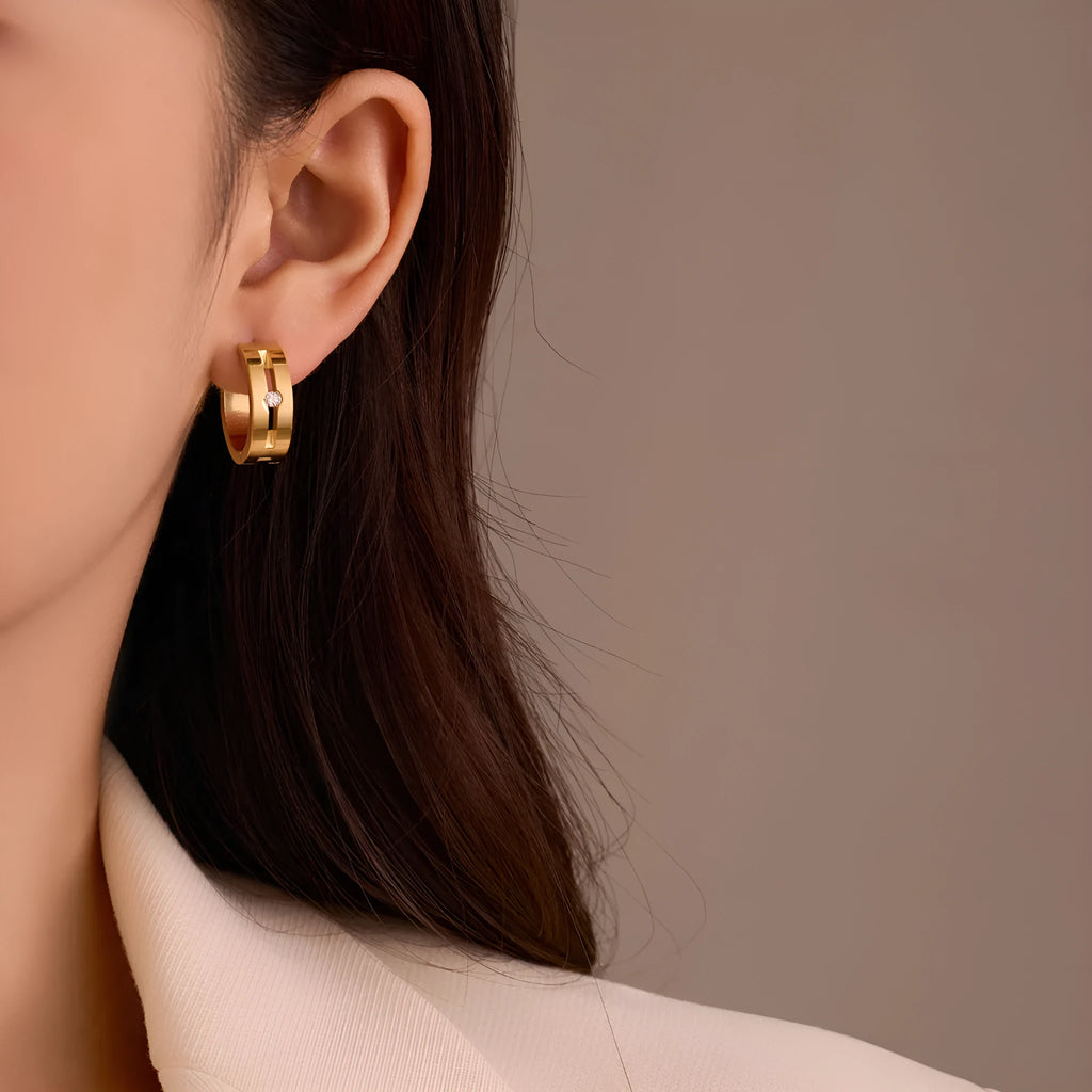 Pair of geometric diamond ear clips in 18K electroplated stainless steel, shown in gold, colour matching, and rose gold options