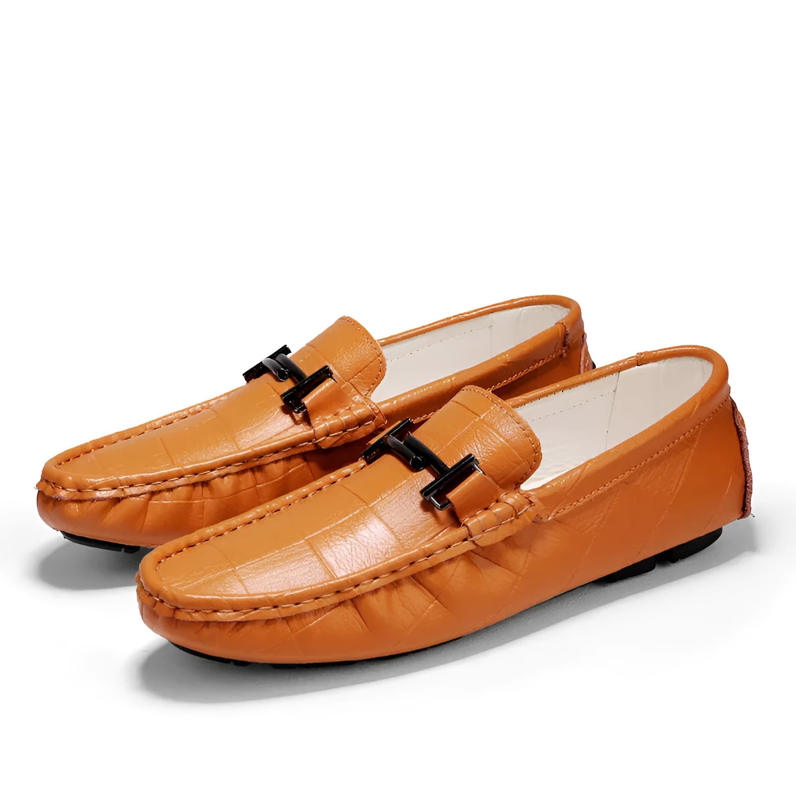 Men's casual leather shoe with a belt buckle on the upper, shown in one of four available colours.