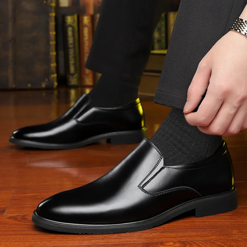 Men's black business casual slip-on shoes with renewable leather upper and rubber sole