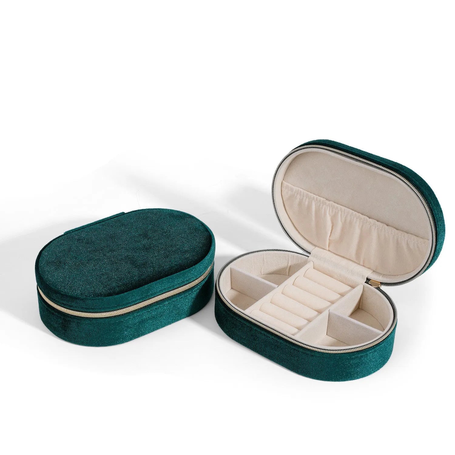 Oval velvet jewellery storage box in lake blue with flannel interior, measuring 15 by 10 cm.