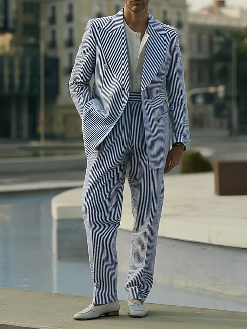 Blue and white striped polyester suit set with blazer and matching trousers