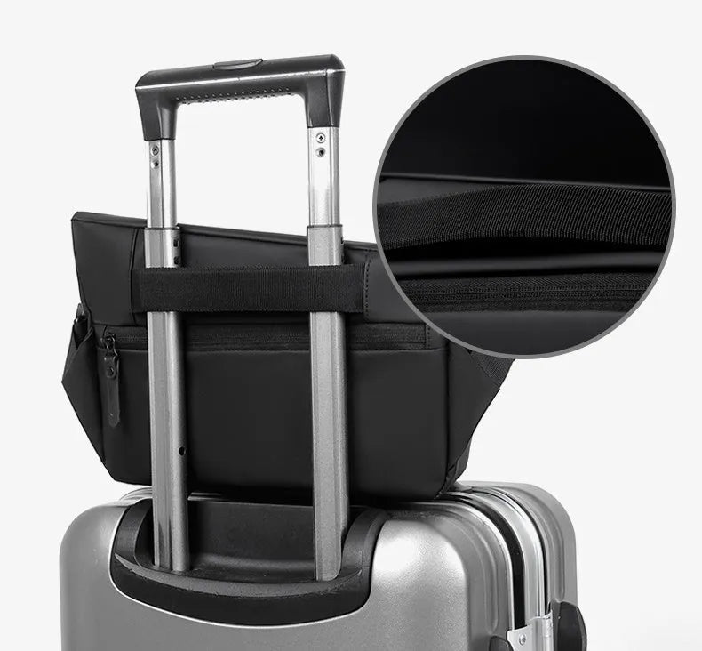 Grey crossbody bag for men showing horizontal square shape, shoulder strap, and zipper opening