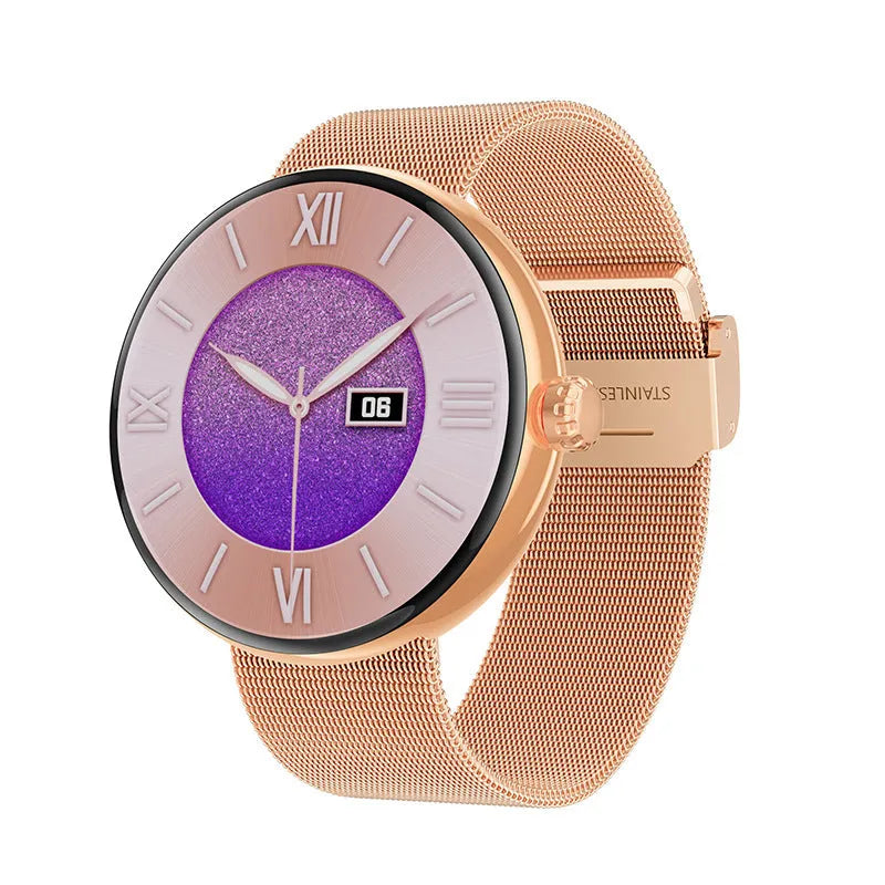 Circular smart watch with metal strap on a woman's wrist, showing colour touchscreen display.