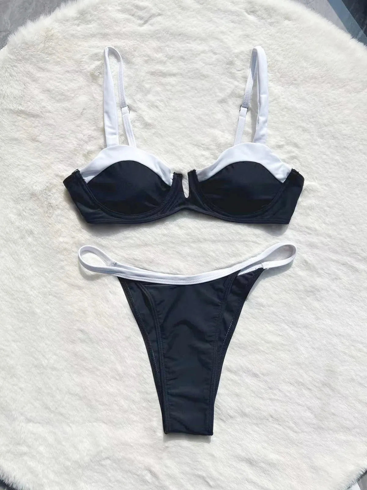 Black low waist women's bikini swimsuit with stitching split design detail