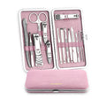 Pink 15-piece stainless steel manicure tool set in compact case measuring 15.5 by 8.2 by 1.3 cm