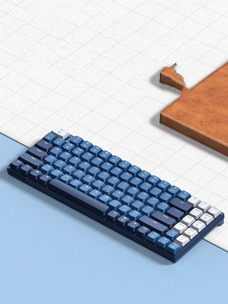 Ku102 mechanical keyboard in deep sea blue with tea axis switches, USB Bluetooth Type-C, and monochrome backlight.