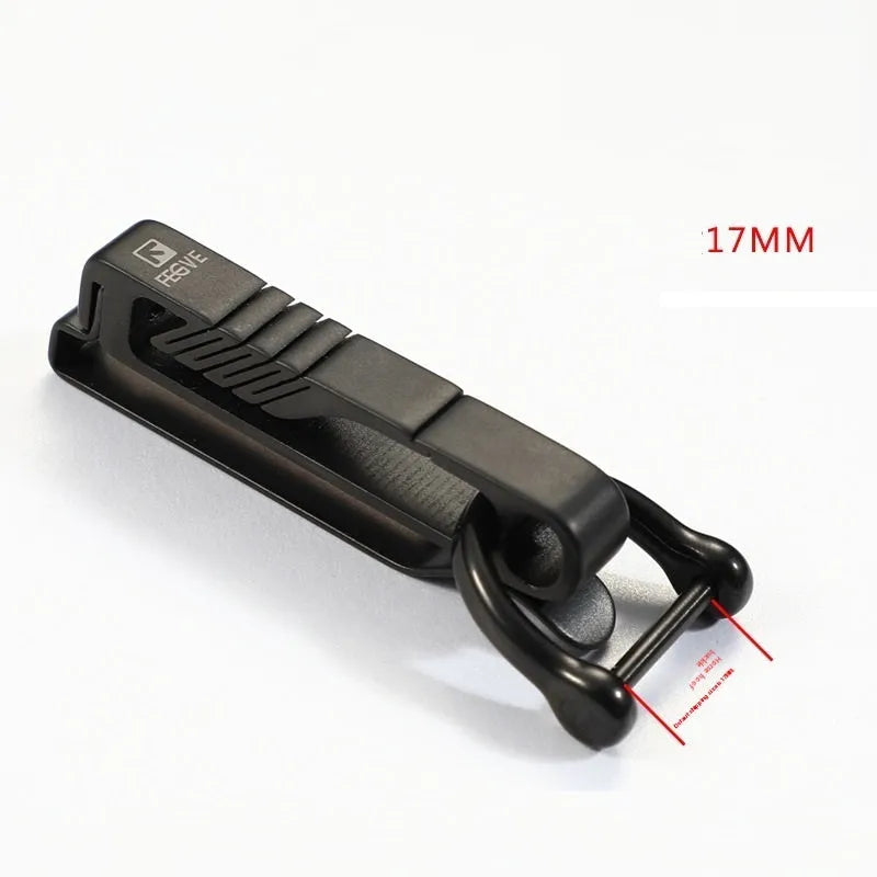Titanium alloy key ring pendant with black buckle belt attachment, shown in sizes 9mm, 13mm, 17mm, and 21mm